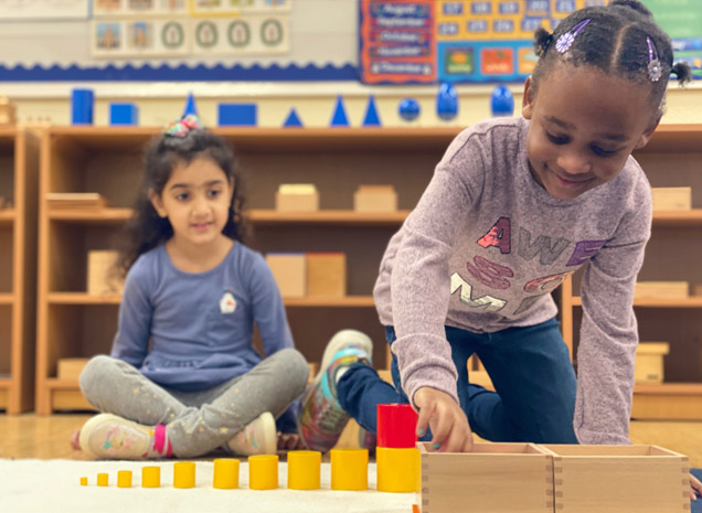 Montessori School of Tracy teacher working with a preschool/kindergarten child