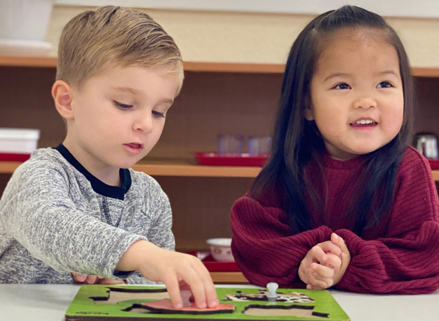 Montessori School of Tracy teacher working with two year old toddler program